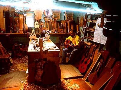 Guitar-maker Jesus H. Fuerte in his workshop. He and other guitarreros in Paracho manufacture as many as 80,000 guitars a year, which retail for $50 to $3,000.
