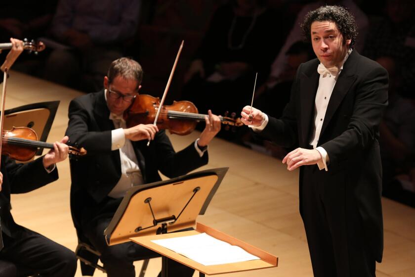 Gustavo Dudamel, pictured Thursday during the Mozart & Pärt mini-festival. On Saturday afternoon, the conductor led the Los Angeles Philharmonic through two Mozart symphonies and the premiere of an Arvo Pärt arrangement of a 1988 piece for a cappella chorus.