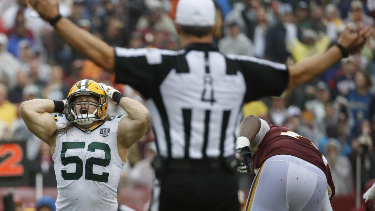 Green Bay linebacker Clay Matthews reacts after being called for roughing the passer for a third straight week.