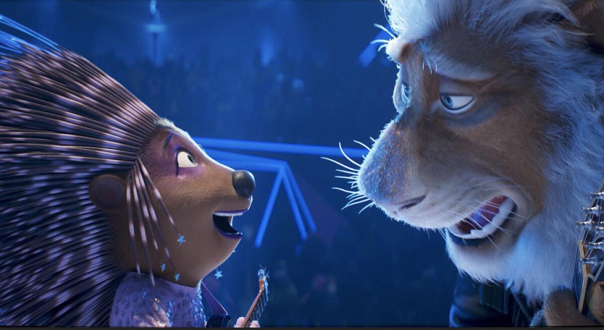 (Left) Ash (Scarlett Johansson) and Clay Calloway (Bono) in Illumination's Sing 2, written and directed by Garth Jennings.