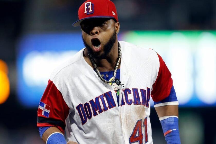 Dominican Republic first baseman Carlos Santana reacts after a double play against Venezuela in a second-round World Baseball Classic game in San Diego on March 16.