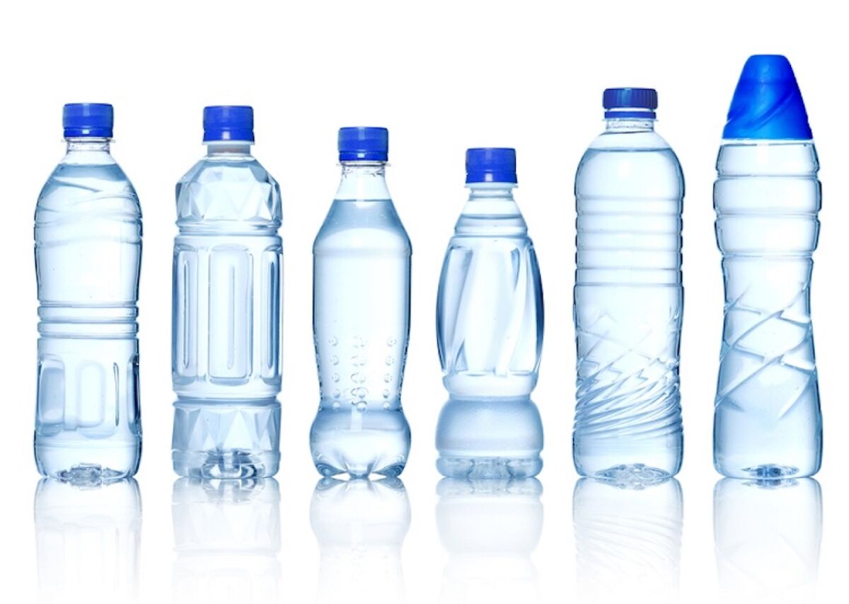 A lineup of plastic water bottles.