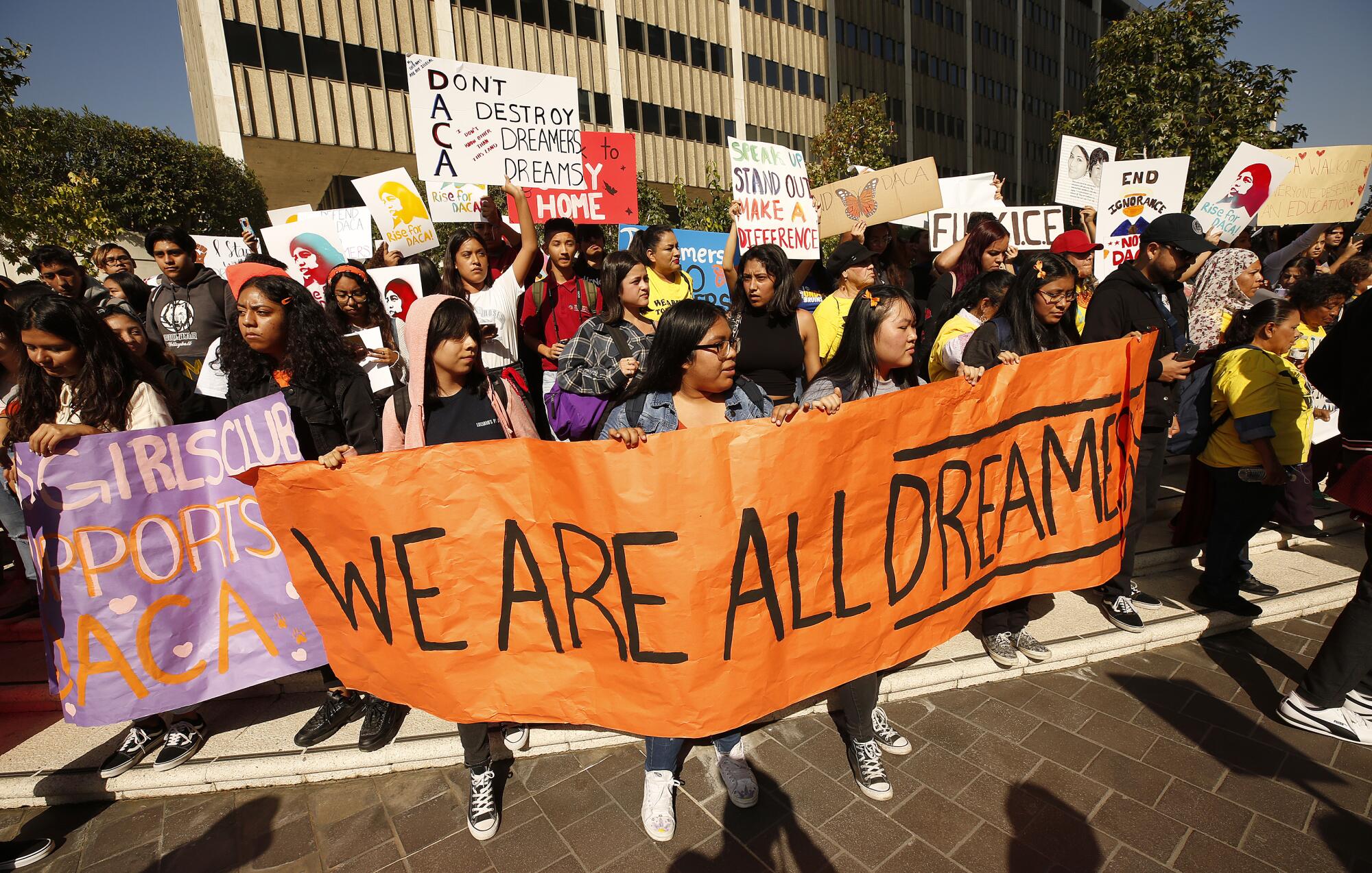 High school students and others rally at the Roybal Federal Building in downtown Los Angeles.