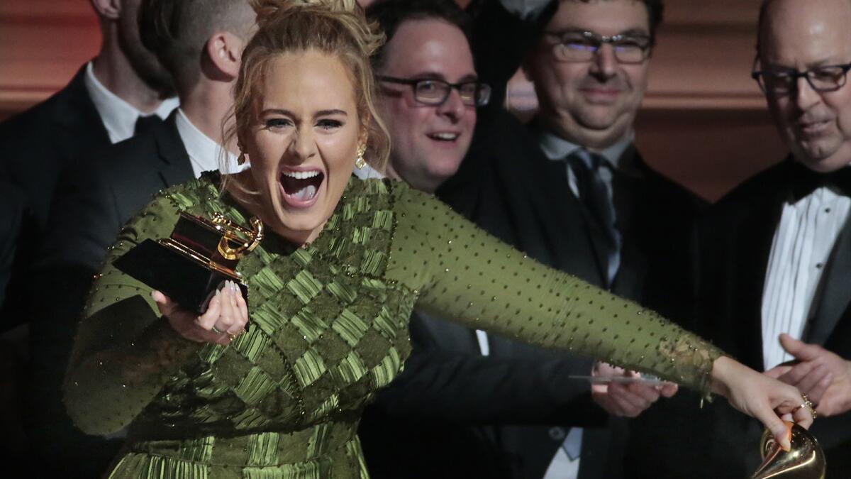 Adele onstage at Staples Center in February 2017 after winning album of the year for "25."