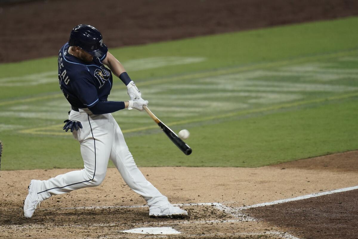 The Rays' Mike Brosseau hits a go-ahead homer during the eighth inning in Game 5 of the ALDS on Oct. 9, 2020.