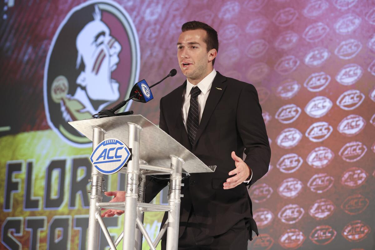 FILE - Florida State quarterback McKenzie Milton answers a question during an NCAA college football news conference at the Atlantic Coast Conference media days in Charlotte, N.C., in this Thursday, July 22, 2021, file photo. Milton, who won his last 24 starts at UCF, now is attempting a comeback with Florida State and competing with Jordan Travis for the right to open the season as the Seminoles’ starting quarterback.(AP Photo/Nell Redmond, File)