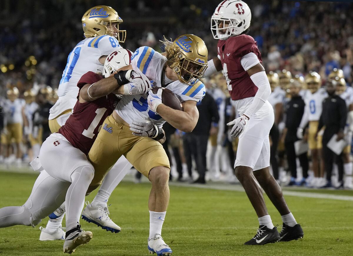 UCLA running back Carson Steele scores a touchdown against Stanford in the first half on Saturday.