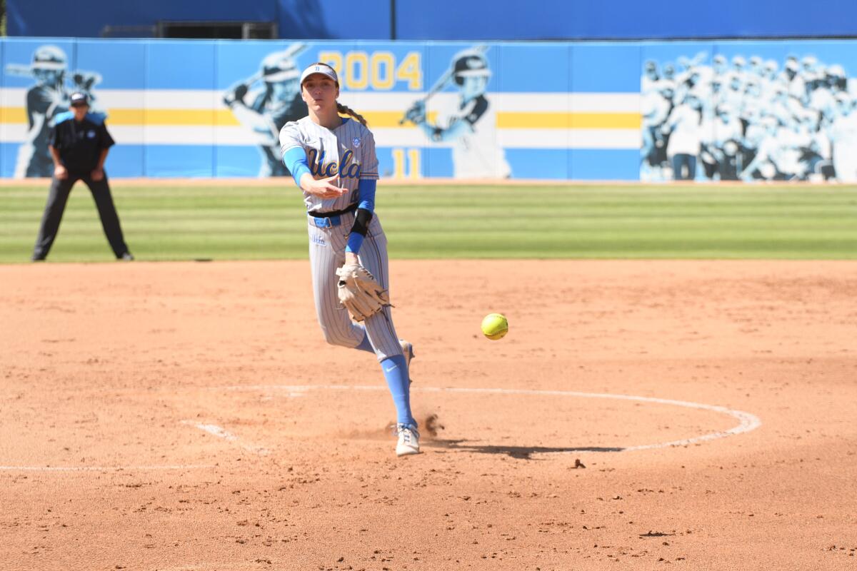 UCLA pitcher Holly Azevedo follows through on a pitch against Mississippi.