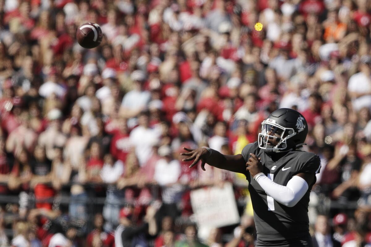 Washington State quarterback Cameron Ward throws a pass during the first half Sept. 24, 2022.