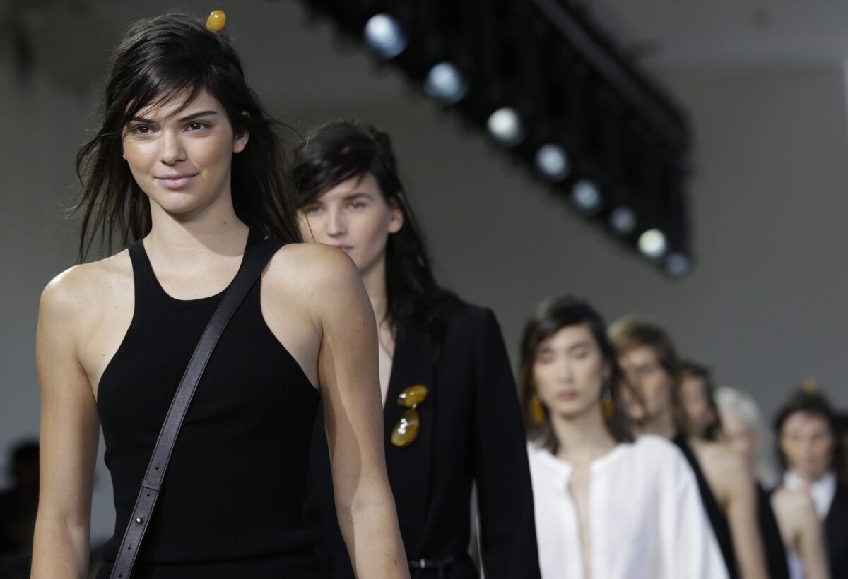 DKNY debuts without Donna Karan while a smiley Kendall Jenner leads the Michael  Kors show - Los Angeles Times