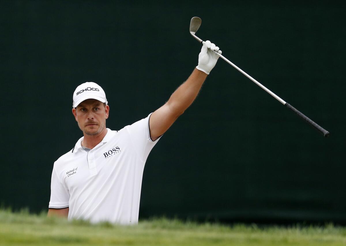 Henrik Stenson celebrates after making birdie from the bunker on the 17th green during the final round of the Deutsche Bank Championship in Norton, Mass., on Monday.