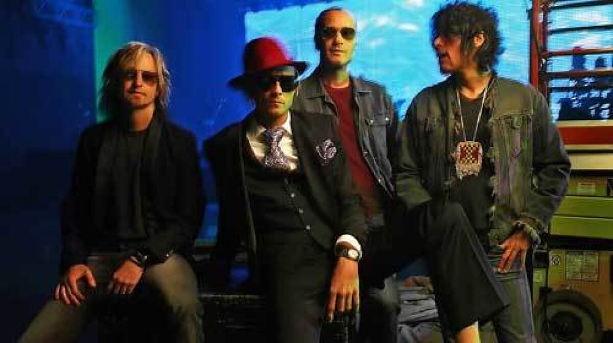 REUNITED: STP plays the Hollywood Bowl on Tuesday. Eric Kretz, from left, Scott Weiland, Robert DeLeo and Dean DeLeo.