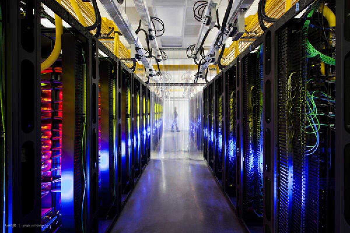 This undated photo made available by Google shows the campus-network room at a data center in Council Bluffs, Iowa. Routers and switches allow Google's data centers to talk to each other.