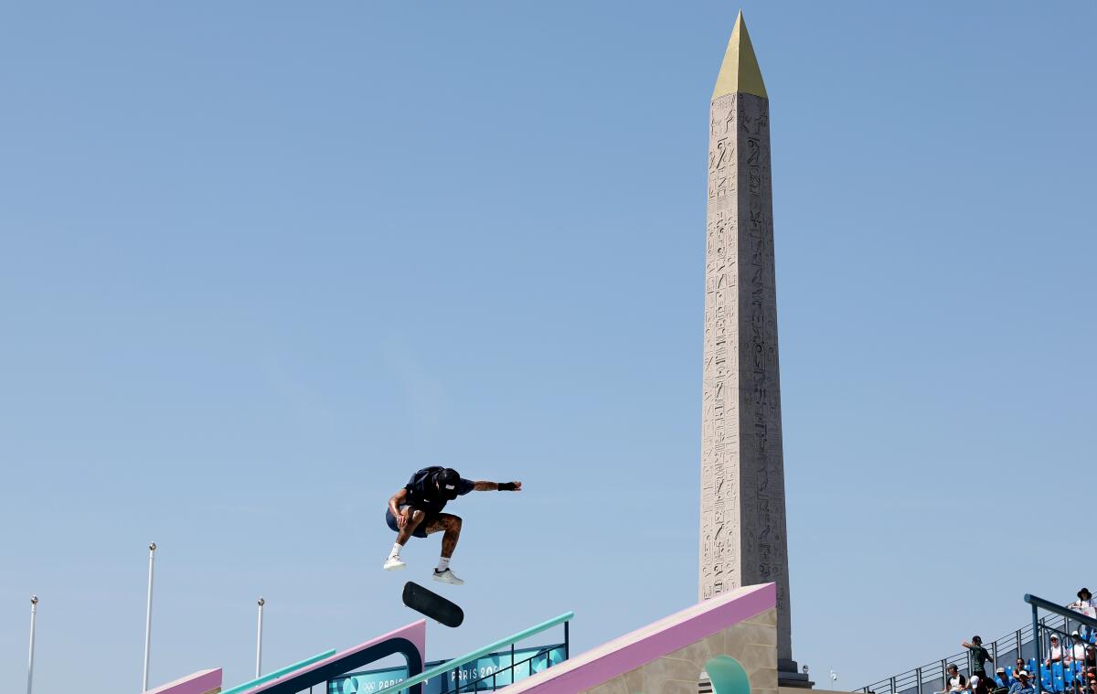 American Nyjah Huston completes a trick during the preliminaries of the men's street skateboard competition.
