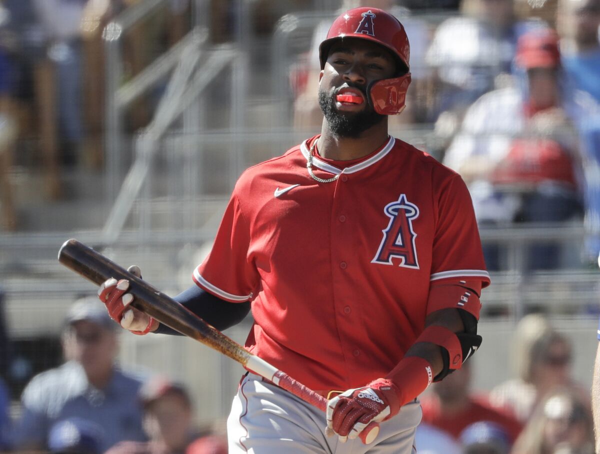 Los Angeles Angels' Jo Adell during the third inning of a spring training baseball game against the Los Angeles Dodgers, Wednesday, Feb. 26, 2020, in Glendale, Ariz. Top prospect Jo Adell is joining the Angels, a baseball source with knowledge of the decision tells The Associated Press. The source spoke on condition of anonymity Monday, Aug. 3, 2020 because the Angels hadn't yet announced the transaction. (AP Photo/Gregory Bull)