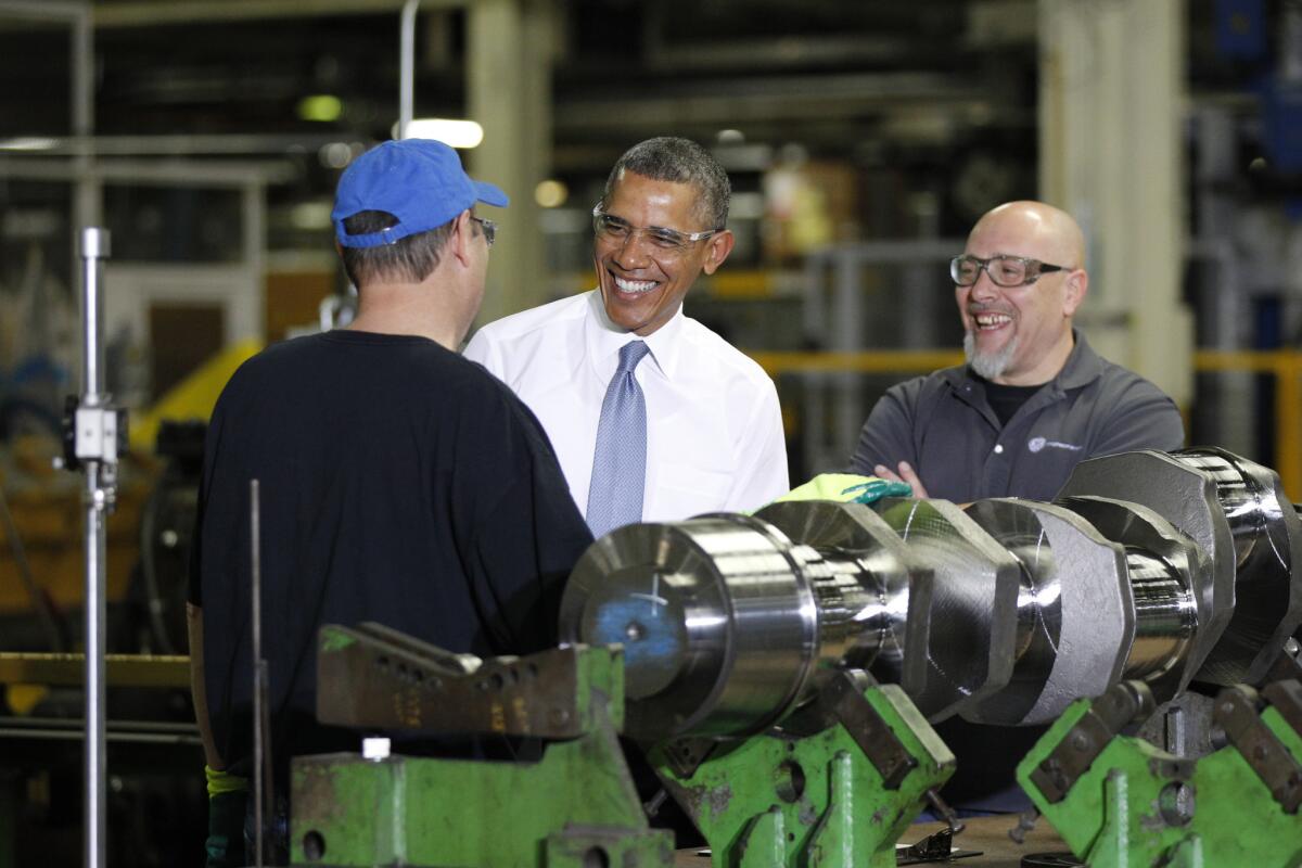 President Obama speaks with employees at GE Energy in Waukesha, Wis.