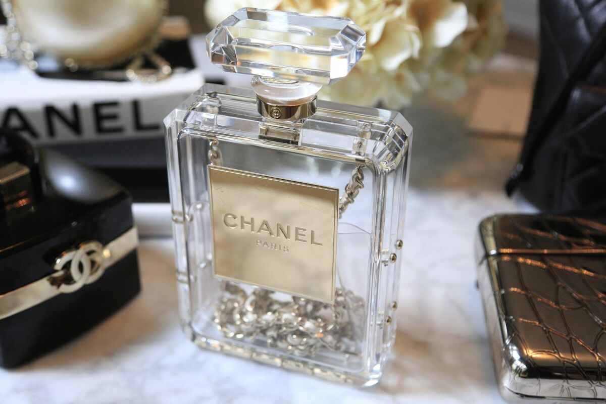 A Chanel bag shaped like a perfume bottle sells for $11,500 at Designer Vault. — David Brooks