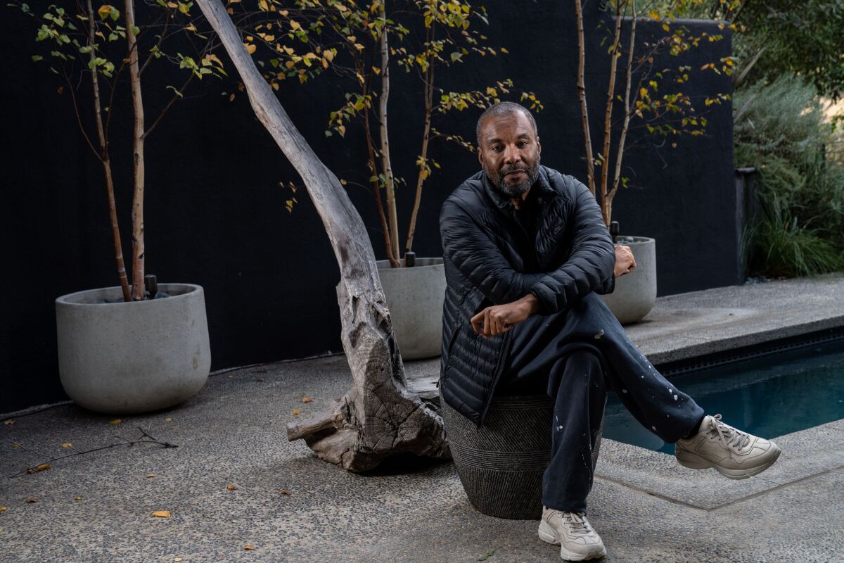 Lee Daniels poses for a portrait outside his home