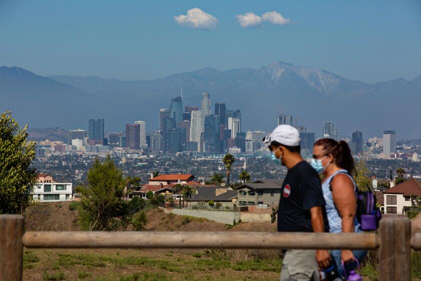 LOS ANGELES, CA - AUGUST 08: People enjoy a hike with amazing views in Kenneth Hahn park on a summer weekend in Los Angeles during the coronavirus pandemic Saturday, Aug. 8, 2020 in Los Angeles, CA. (Jason Armond / Los Angeles Times)
