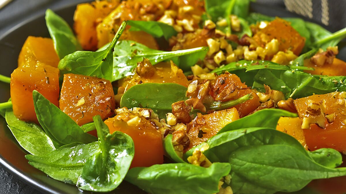 Warm Winter Spinach and Butternut Squash Salad with Chopped Nuts