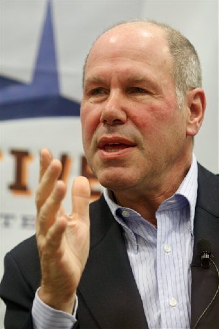 FILE - In this March 11, 2008 file photo, former Disney chief Michael Eisner participates in a question and answer panel at the SXSW Film and Interactive Festival in Austin, Texas. In hindsight, Eisner calls his decision in 1995 to buy CapCities/ABC, and with it, its crown jewel ESPN, "one of the best acquisitions maybe of that whole century." (AP Photo/Jack Plunkett, File)