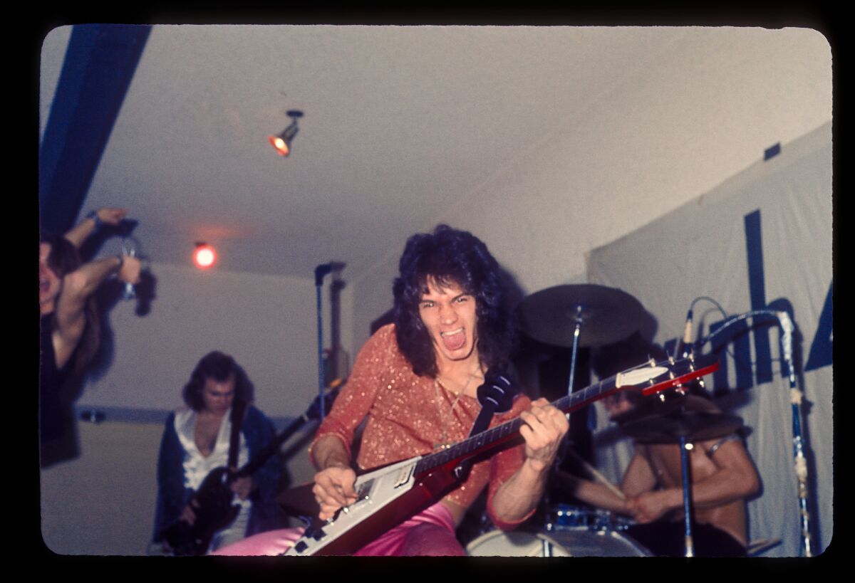 Eddie Van Halen performing with Van Halen in 1975.