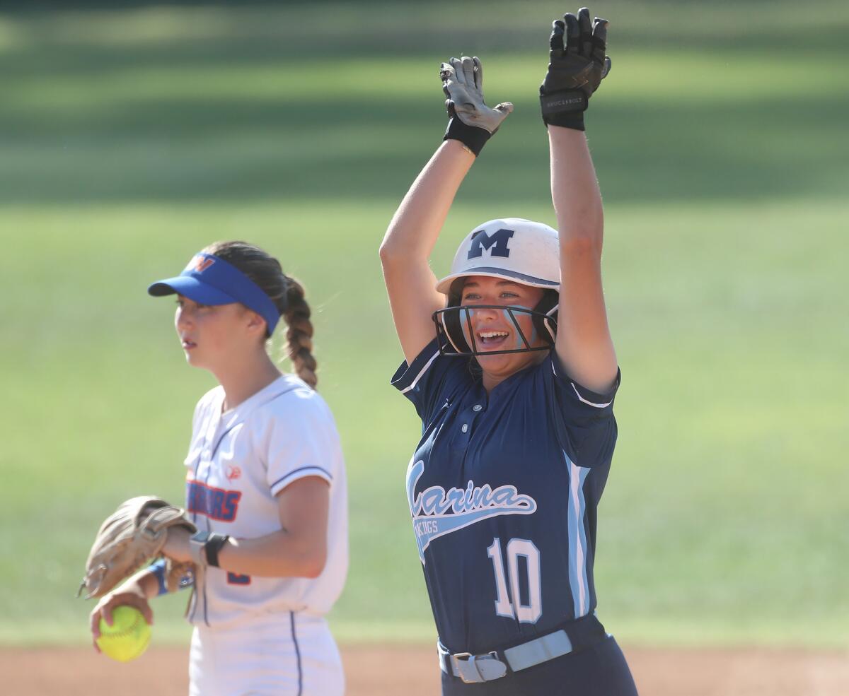 Marina's Eva Mazzotti (10) lands on second with a double against Westlake on Friday.