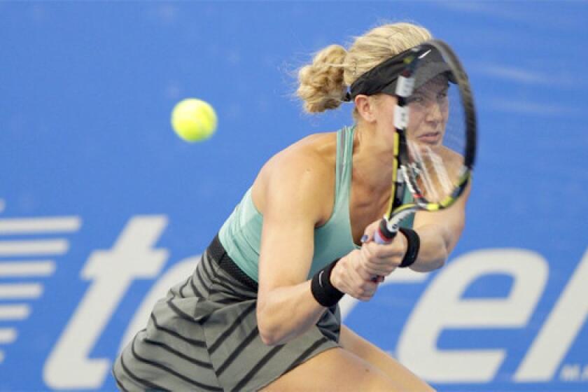 Eugenie Bouchard of Canada returns the ball to Lara Arruabarrena of Spain during their match at the Abierto Mexicano TELCEL tournament in Acapulco on Feb. 26. Bouchard defeated Arruabarrena, 7-5, 6-2.