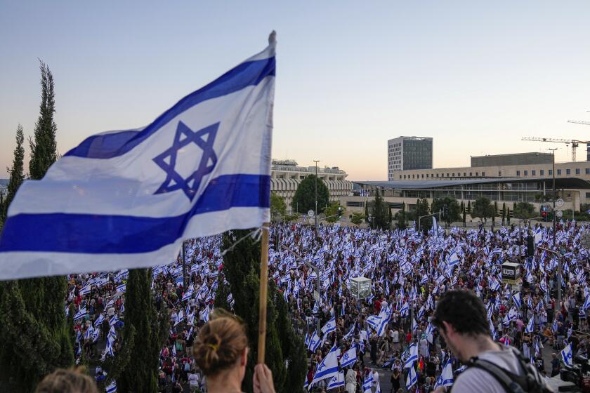 Thousands of Israelis protest against plans by Prime Minister Benjamin Netanyahu's government to overhaul the judicial system, in Jerusalem, Saturday, July 22, 2023. Thousands of demonstrators entered the last leg of a four-day and nearly 70-kilometer (roughly 45-mile) trek from Tel Aviv to Jerusalem. Protest organizers planned to camp overnight outside Israel's parliament on Saturday. (AP Photo/Ohad Zwigenberg)