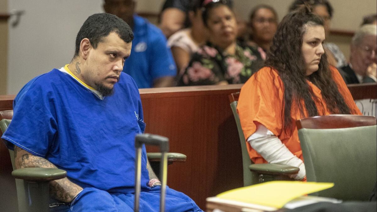 Heather Barron, right, and her boyfriend Kareem Leiva, enter a not guilty plea on Wednesday in the slaying of Barron's 10-year-old son Anthony Avalos.