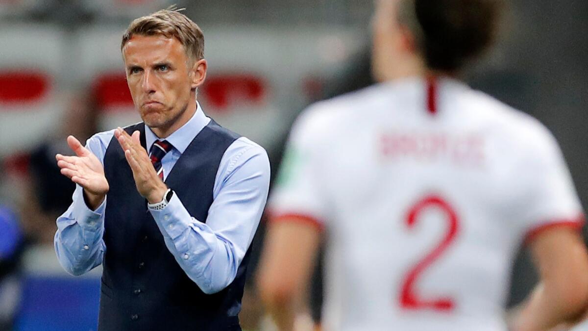 England coach Phil Neville gestures during a match against Japan at the Women's World Cup on June 19. Neville isn't pleased with the U.S. women's national team sending over two staffers to check out the English team's hotel.