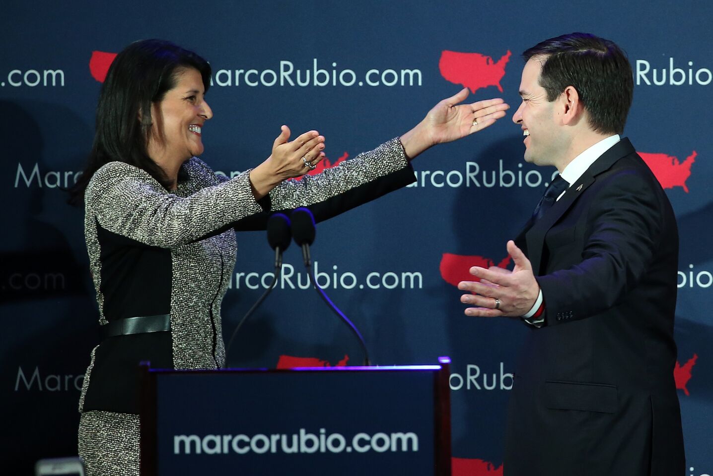 Republican presidential candidate Marco Rubio is greeted by South Carolina Gov. Nikki Haley before addressing supporters at a primary night event in Columbia.