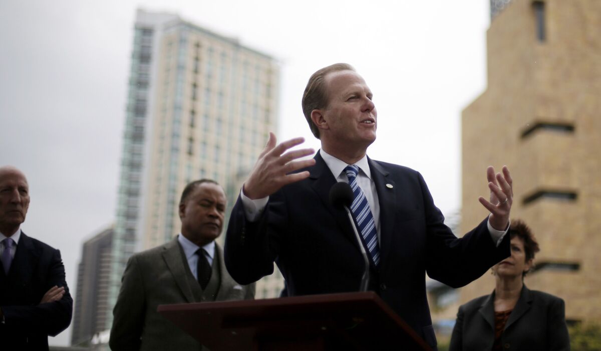 San Diego Mayor Kevin Faulconer addresses the media and football fans on Jan. 30 about the city's efforts to build a new stadium for the San Diego Chargers.