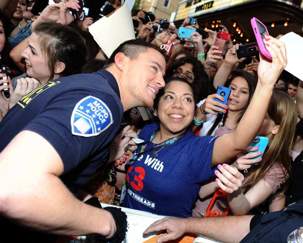 Channing Tatum arrives at the "21 Jump Street" premiere at the Paramount Theatre in Austin.