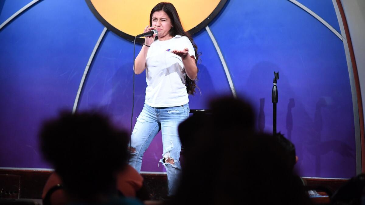 Comedy Camp attendee Ilene Delgado gives her stand-up routine at the Laugh Factory.