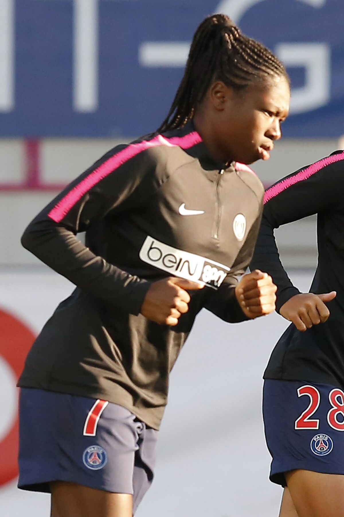 FILE - PSG's Aminata Diallo warms up prior to their Women's Champions League soccer match between Paris-Saint-Germain and Sankt Polten at Jean Bouin stadium in Paris, France, on Sept. 27, 2018. Paris Saint-Germain says that midfielder Aminata Diallo has been taken into police custody following an attack on other players from the women’s team. PSG said in a statement that the 26-year-old Diallo was arrested on Wednesday morning by Versailles police following the attack that took place last Thursday evening. (AP Photo/Michel Euler)
