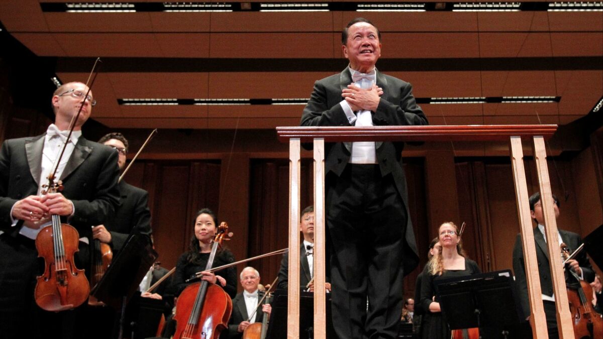 San Diego Symphony music director Jahja Ling acknowledges audience applause after conducting Friday night's concert.