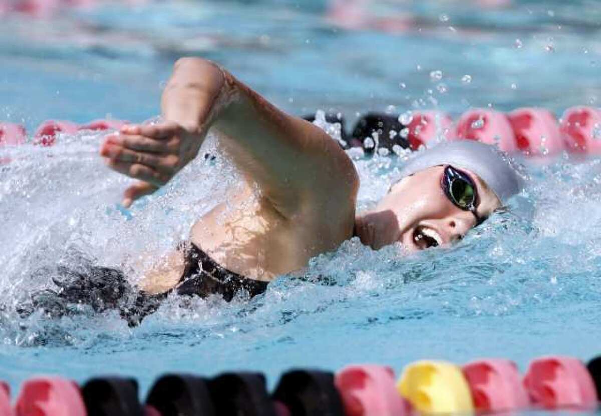 File Photo: La Canada High School's Sarah Olson captured her fourth straight league title in the 100 freestyle, but bested Natalie Norberg's 1992 record with a time of 52.43 in the Rio Hondo League Championships Friday at the Rose Bowl Aquatics Center.