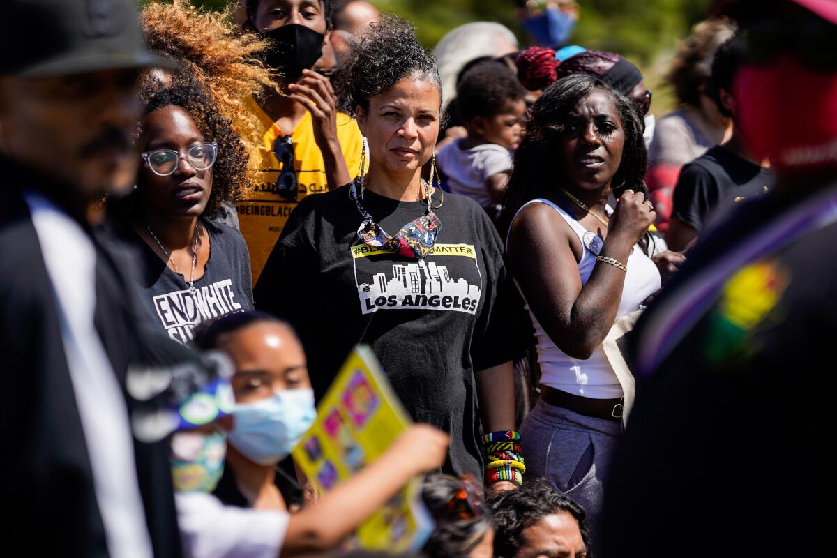 Melina Abdullah and others gather for a group photo at a Black Lives Matter event.