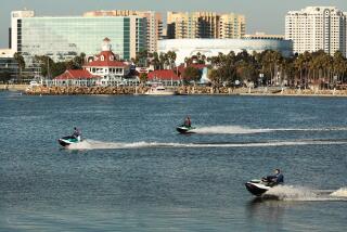 Long Beach, CA - October 14: Various Olympic Venues Long Beach on Monday, Oct. 14, 2024 in Long Beach, CA. View from Harry Bridges Memorial Park towards Shoreline Aquatic Park and Long Beach Shoreline Marina Long Beach will be used for ocean sporting events yet to be determined for the 2028 Summer Olympics. Long Beach Mayor Rex Richardson photographed at his office in Long Beach City Hall. The 2028 Summer Olympics, or LA28, will be hosted by Los Angeles but will have impacts on Long Beach as it will host venues for the 2028 Summer Olympics. (Al Seib / For the Los Angeles Times)