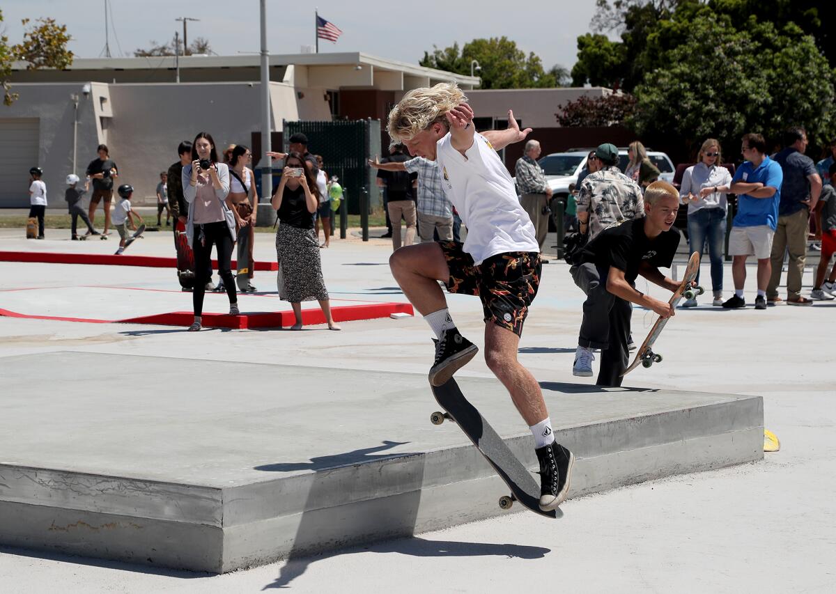 Blaze Roche, 18, enjoys the new Edison Park Skate Spot on Thursday in Huntington Beach.