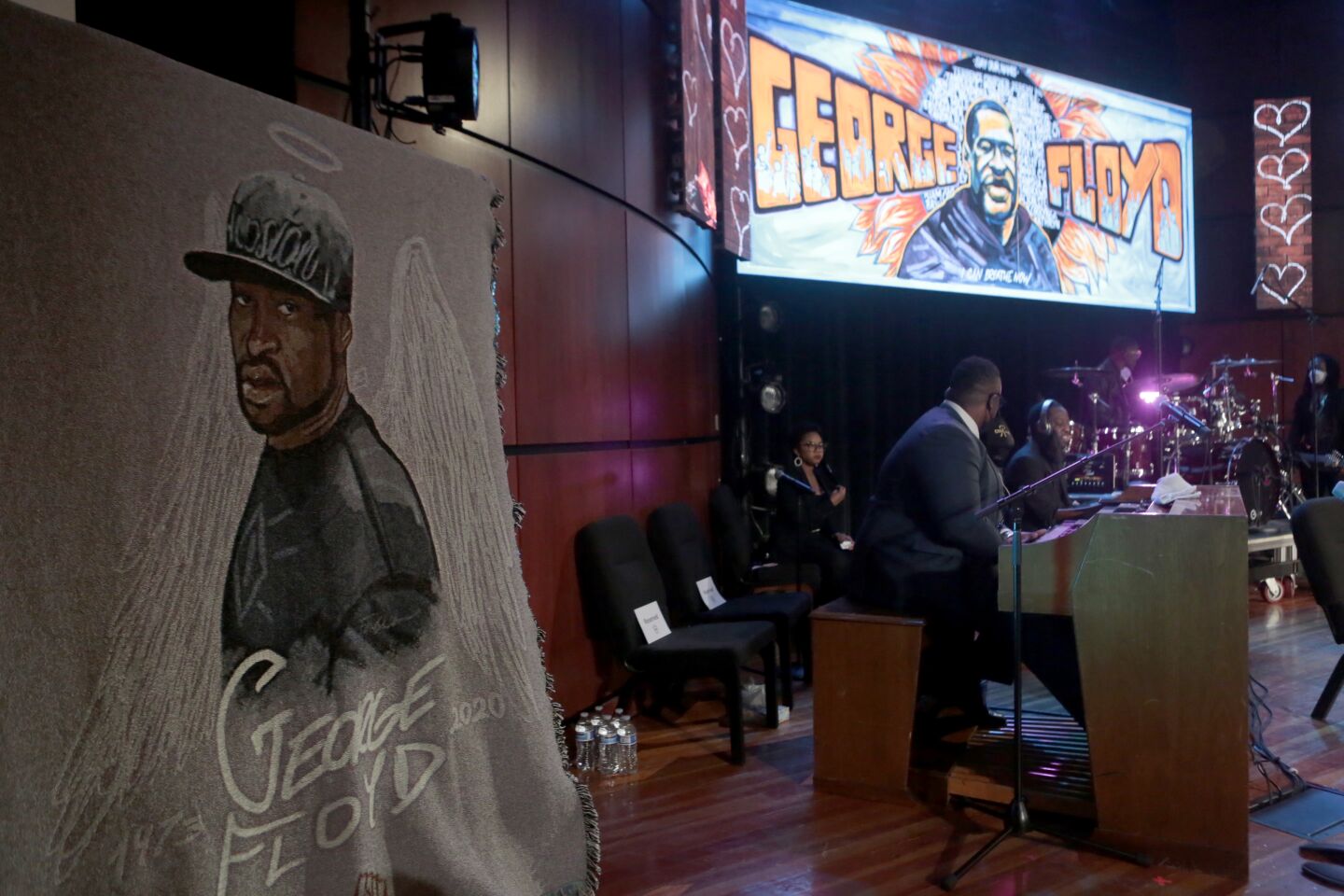 Musicians and a portrait of Floyd at Thursday's memorial.