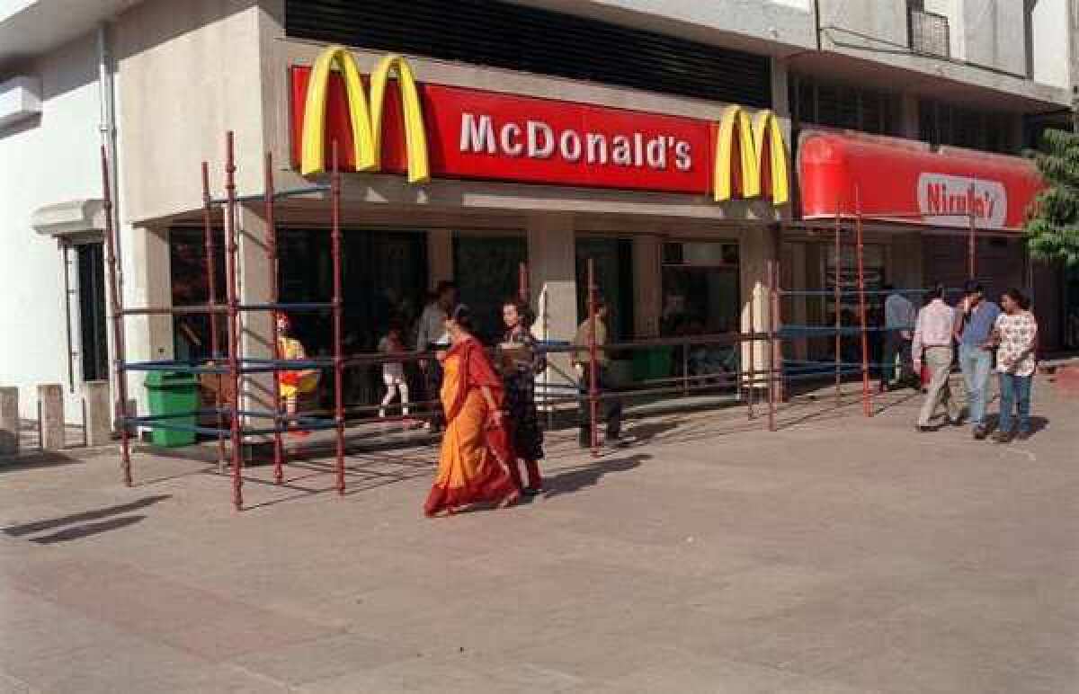 The first golden arches in India were raised in New Delhi in 1996. Now McDonald's plans to open two all-vegetarian restaurants in the country.