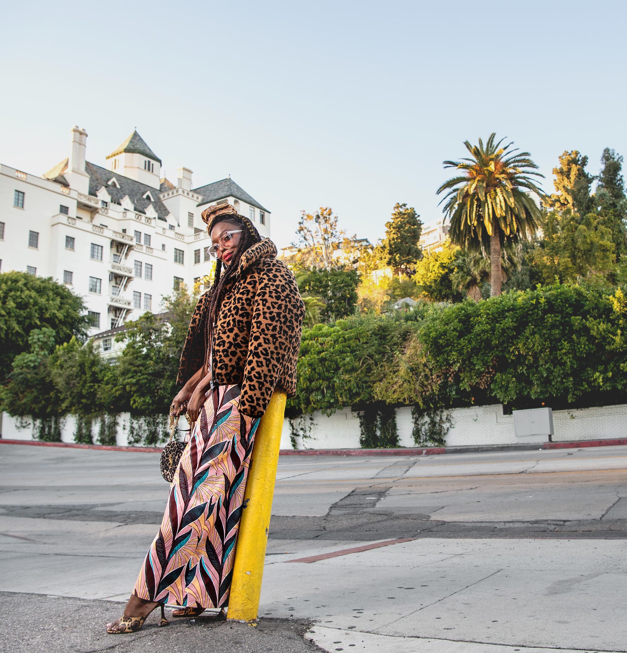 A photo of Autumn Adeigbo outside Pinches Tacos in West Hollywood.