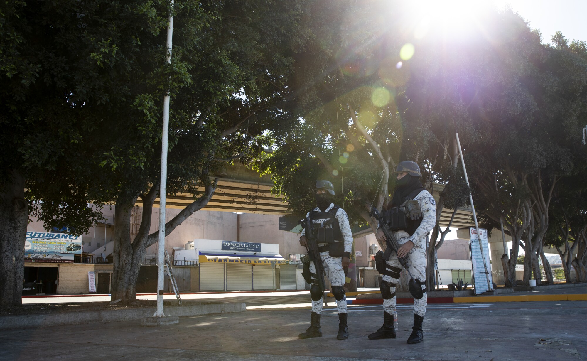 National Guard members watch over El Chaparral plaza 