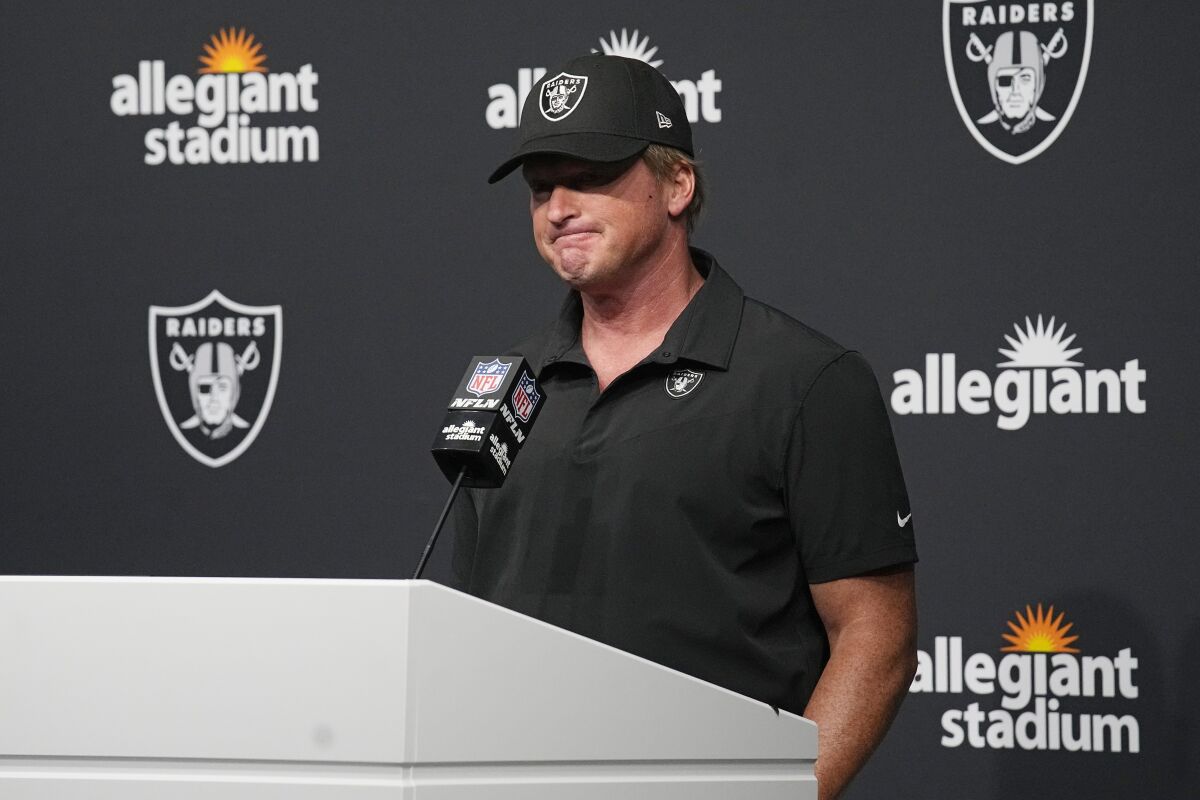 Raiders coach Jon Gruden speaks during a news conference 