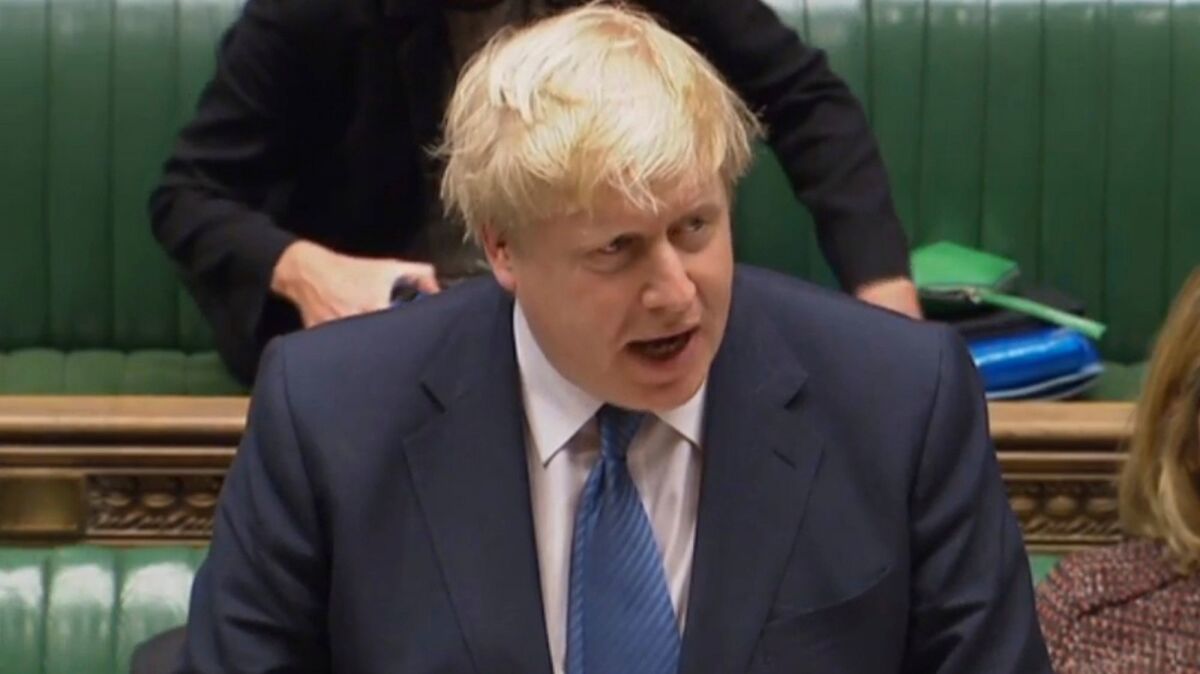 In a letter to the European Union, British Prime Minister Boris Johnson said he personally opposed delaying the U.K.'s Oct. 31 exit. He asked for a three-month delay, grudgingly, to comply with a law passed by Parliament.