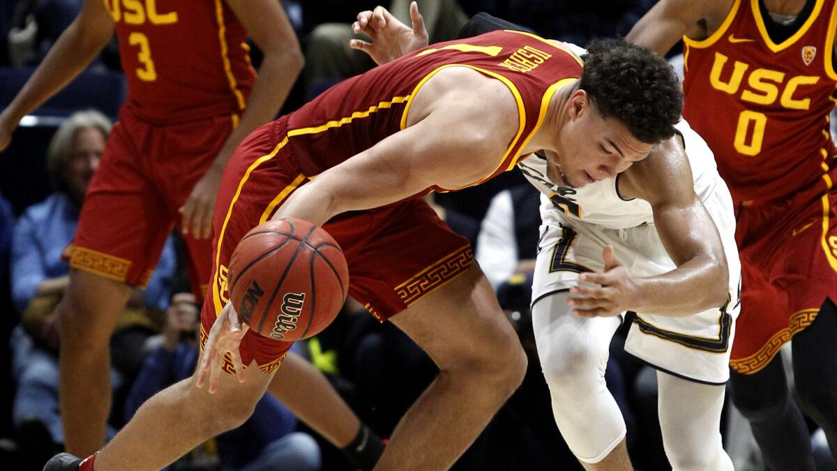 USC's Jordan Usher tracks down a loose ball during the second half of the game against California on Friday.