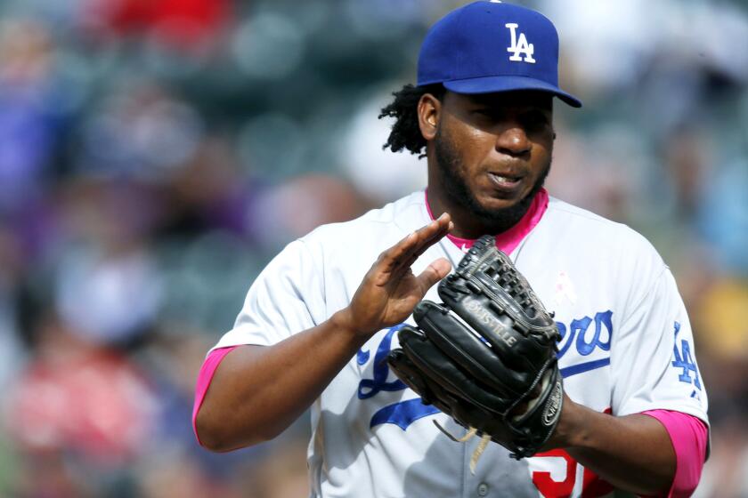Reliever Pedro Baez is recalled by the Dodgers after getting some rest in the minor leagues.
