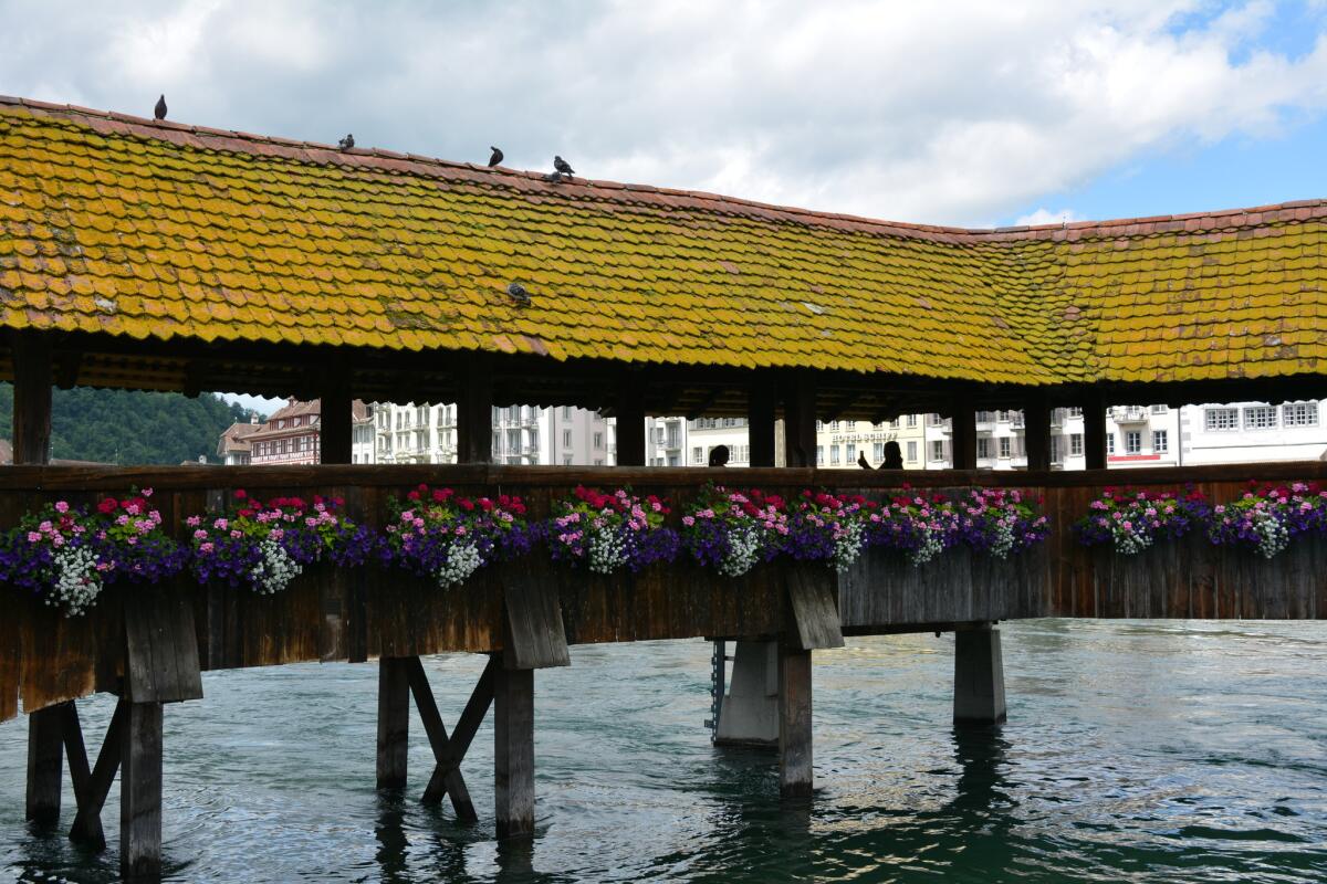 The Chapel Bridge in Lucerne, originally built in the 14th century, is one of Europe's oldest covered bridges.
